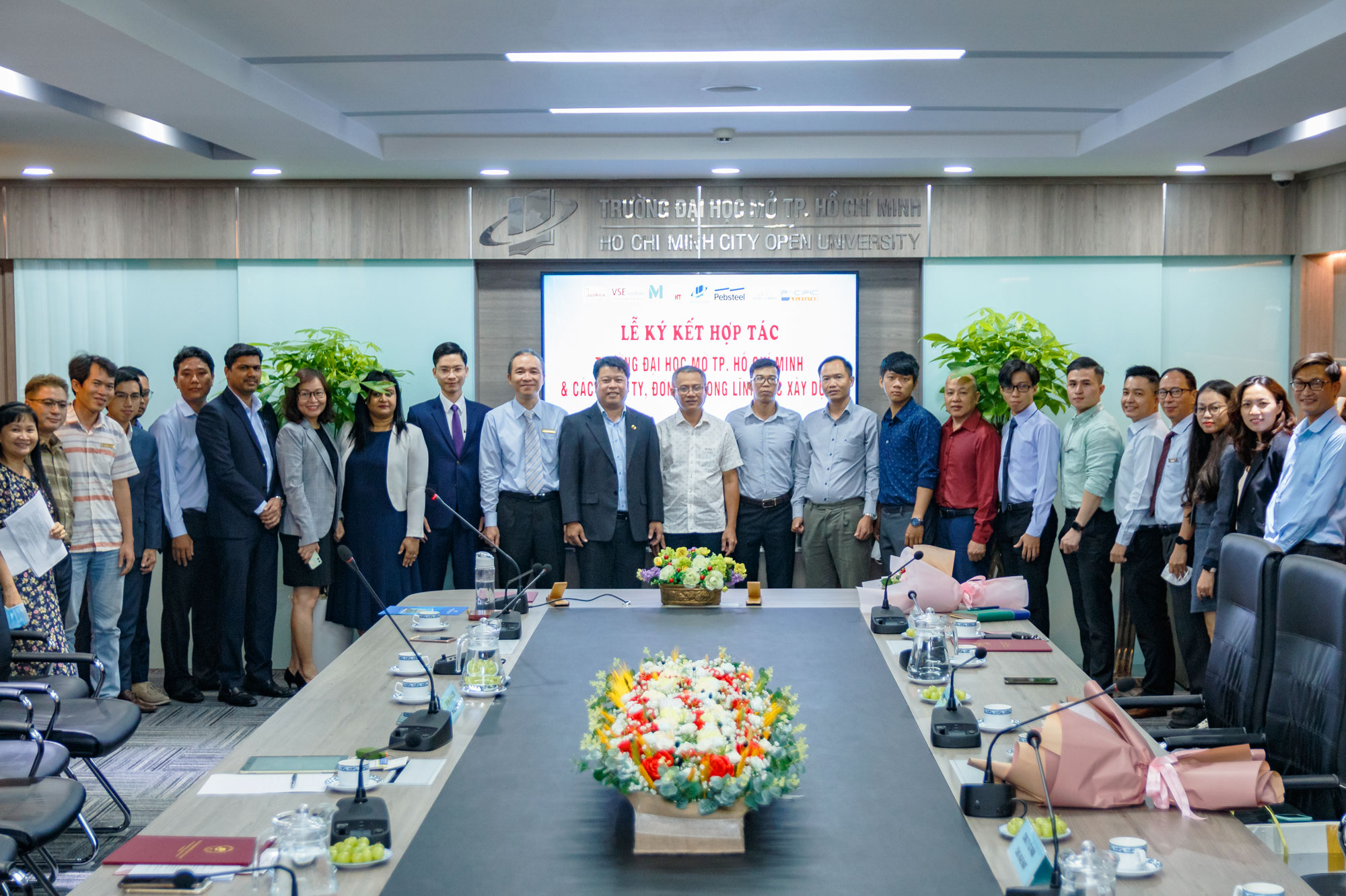 cooperation-signing-ceremony-pebsteel-open-university-hcmc