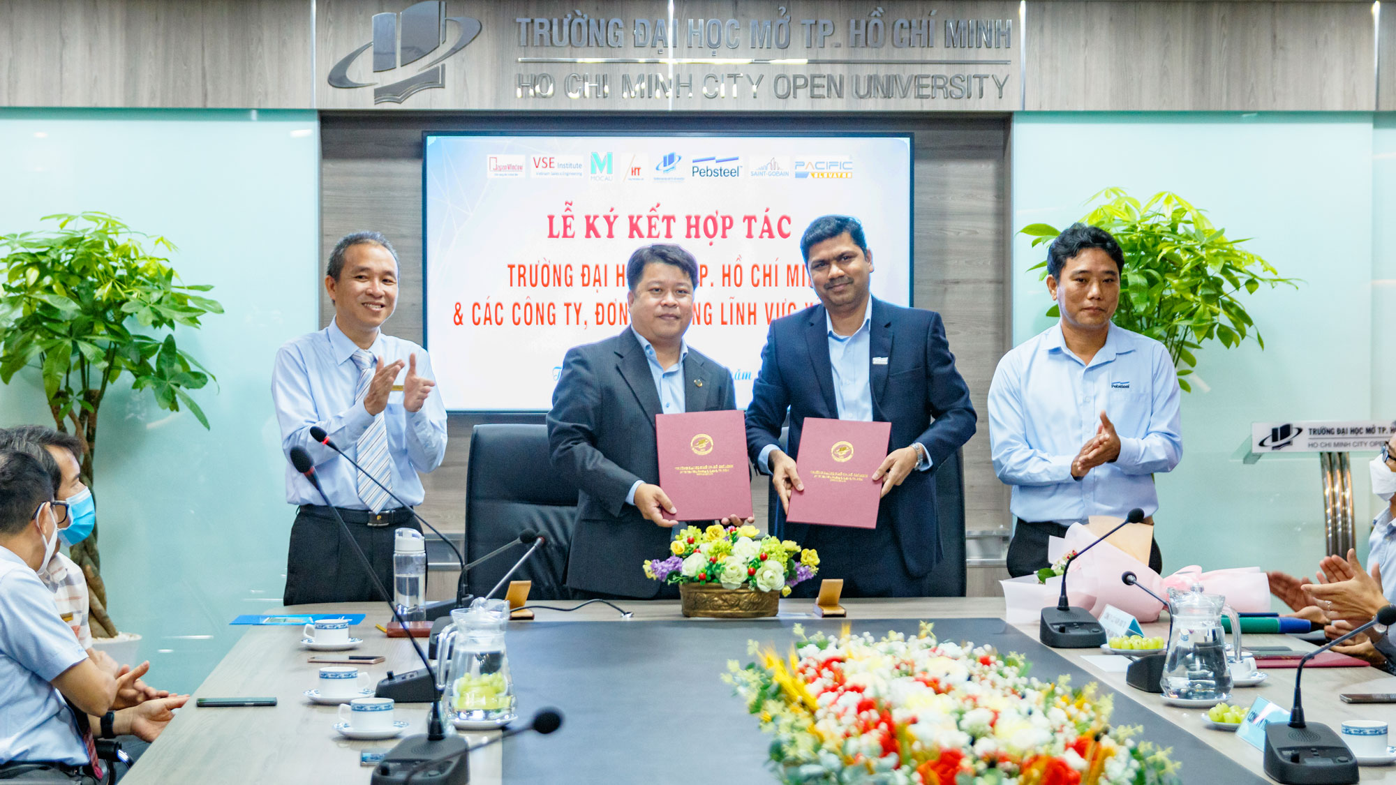 cooperation-signing-ceremony-pebsteel-open-university-hcmc