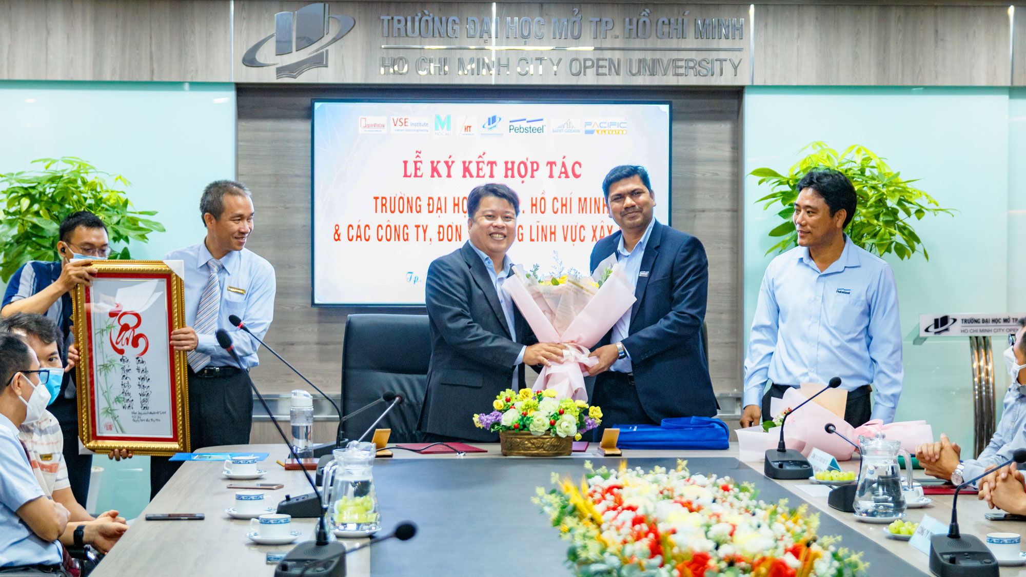 cooperation-signing-ceremony-pebsteel-open-university-hcmc